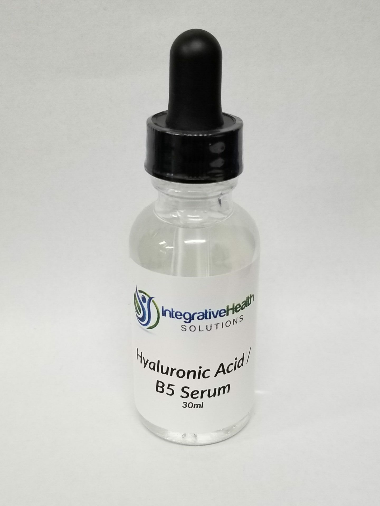 A bottle of hyaluronic acid serum is shown.